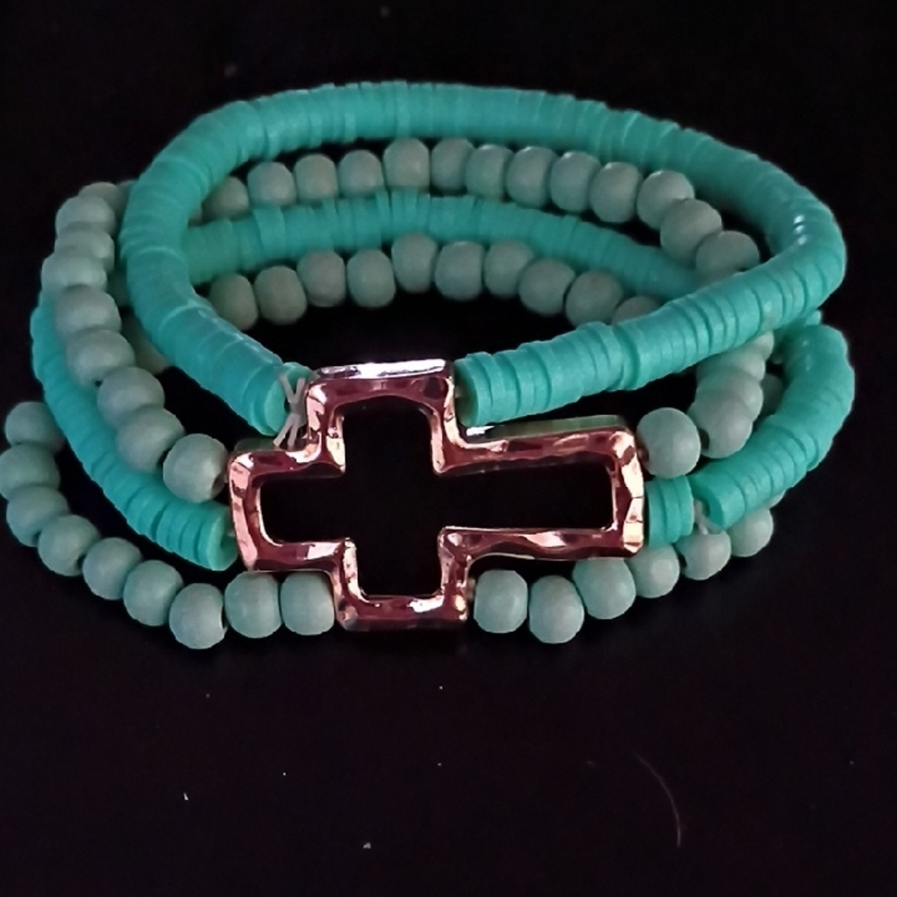 Turquoise Colored Beaded Bracelet with Gold Tone Cross Pendant